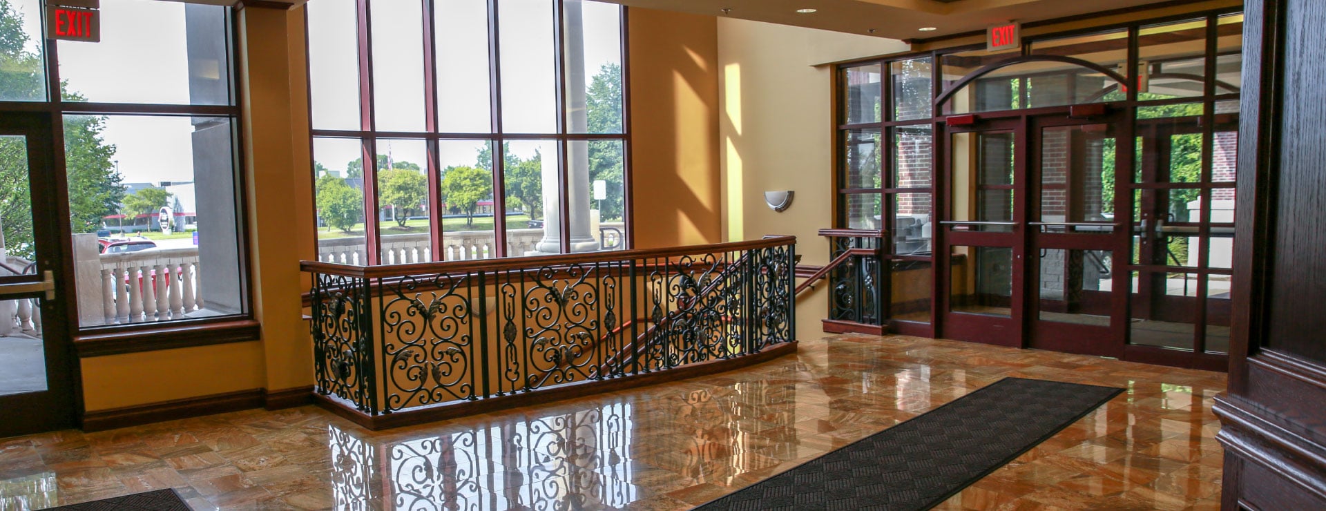 The clinic building lobby with windows and an entrance doorway